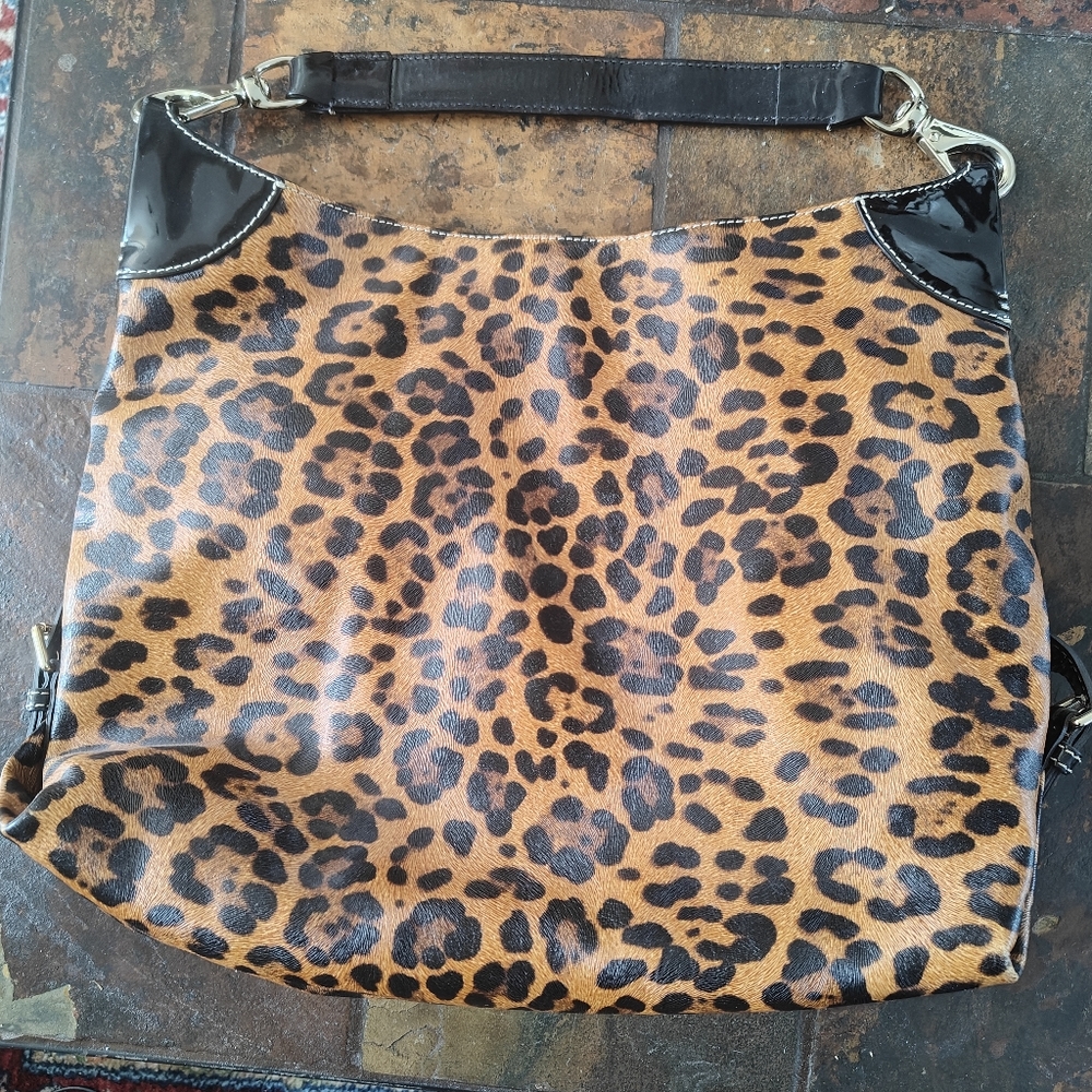 Dooney and Bourke leopard print bag with black patent strap
